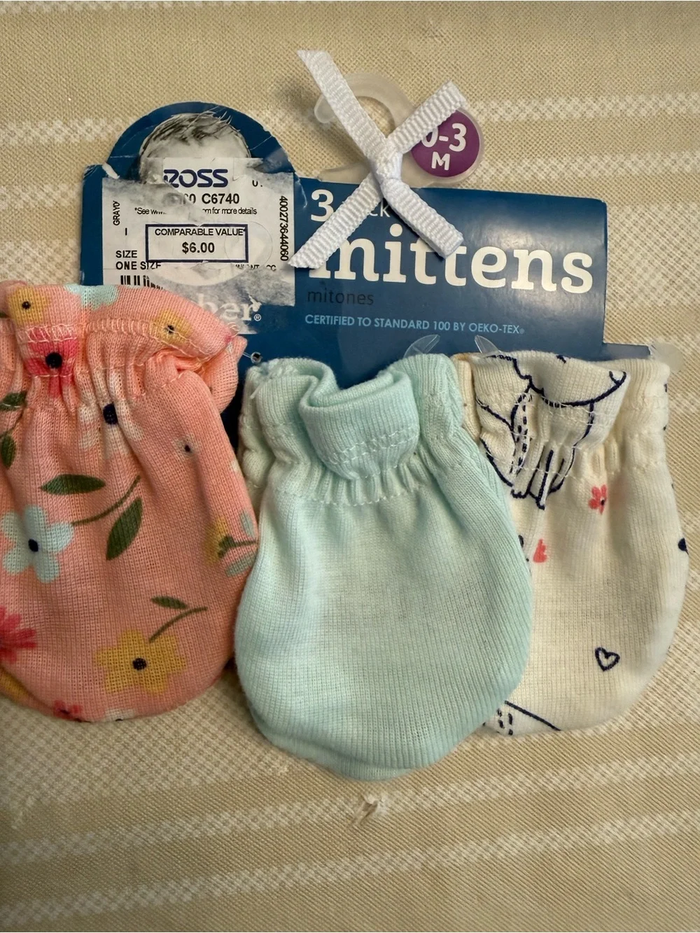Baby bundle, blanket, sweater, pants, hat, and mittens many other items
